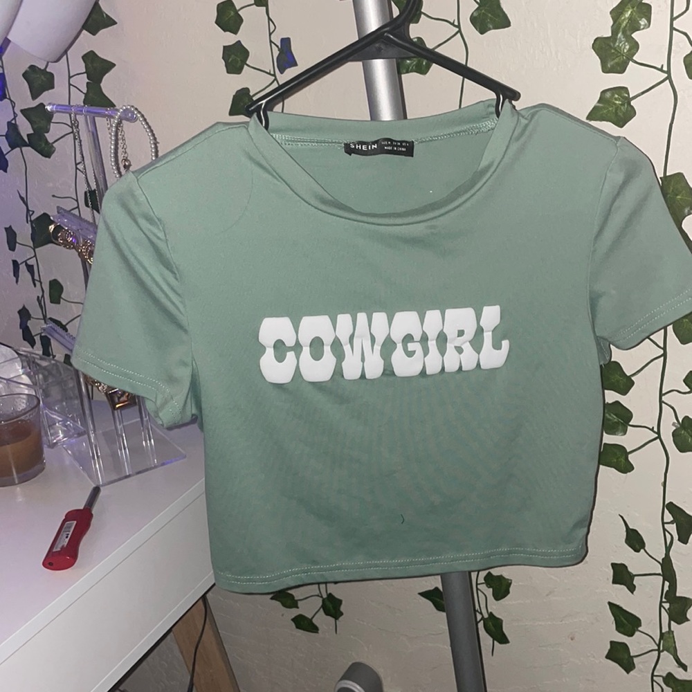 This shirt is super cute on, it runs smaller since it is from shein.